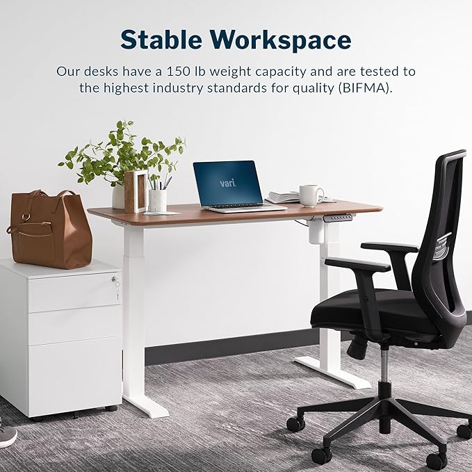Vari Essential Electric Standing Desk for Home Office – 48x24 Sit-Stand VariDesk, 4 Memory Height Presets, 2-Piece Laminate Wood Top, Sturdy T-Style Legs, Supports 150 Lbs + Easy Assembly (Hazel Wood)