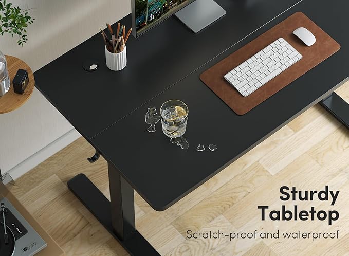 FEZIBO 55 x 24 Inchs Electric Standing Desk, Height Adjustable, Sit Stand Up, Computer Office Desk with Splice Board, Black Frame/Black Top